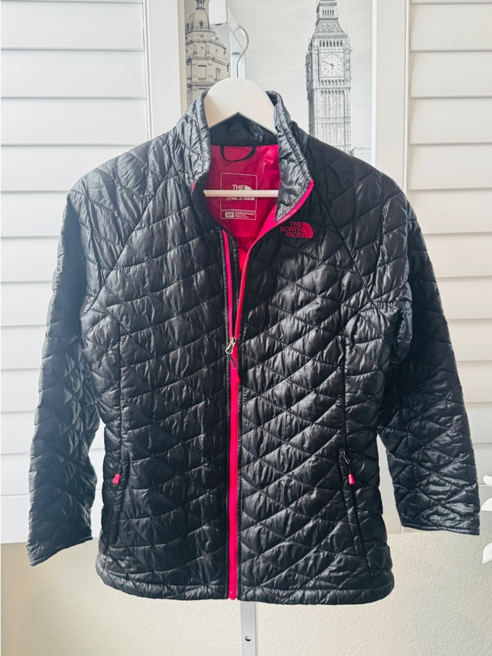 The North Face Women's Black quilted thermoball Jacket with Pink Interior